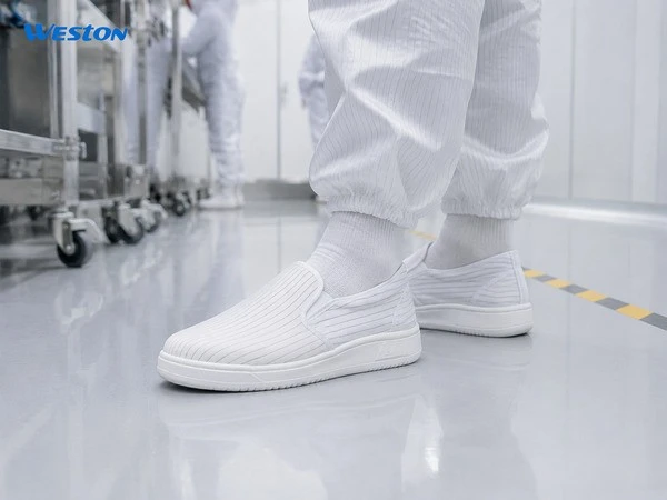 White anti-static cleanroom shoes in use